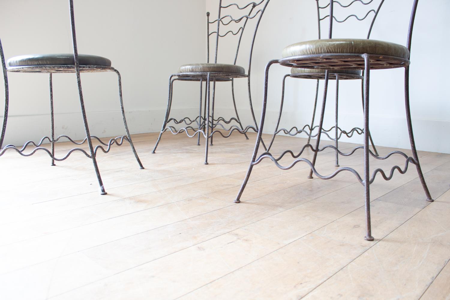 A set of 6 wrought iron chairs in Seating