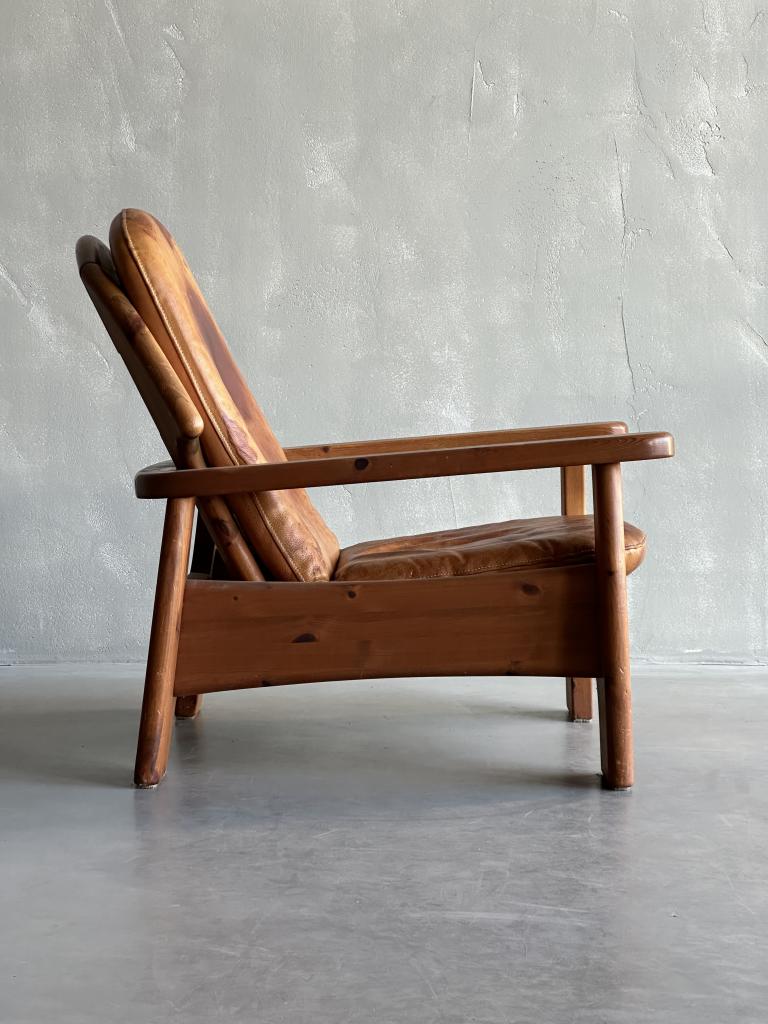 A large C20th Leather and Pine Armchair