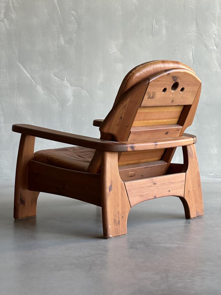 A large C20th Leather and Pine Armchair