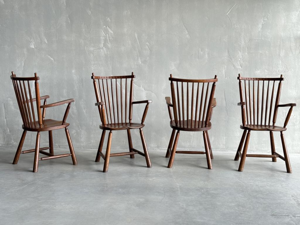A Set of 4 Midcentury Oak Stick Back Chairs