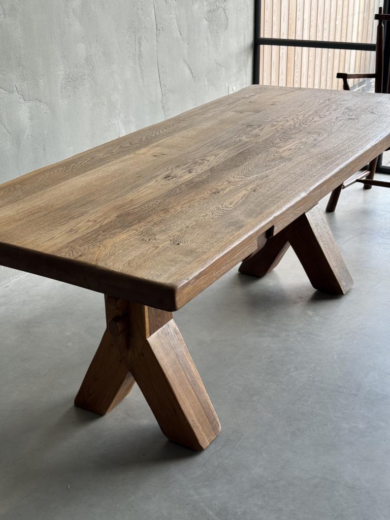 An Oak Dining Table by De Puydt