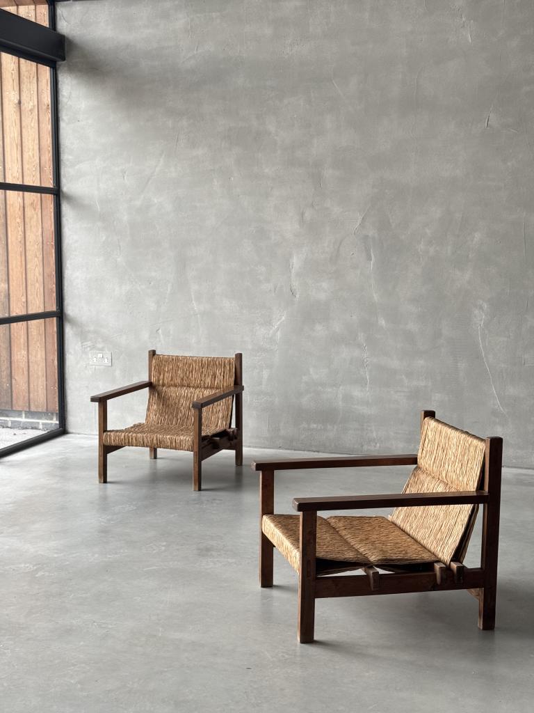 A pair of Spanish Rush seat Armchairs
