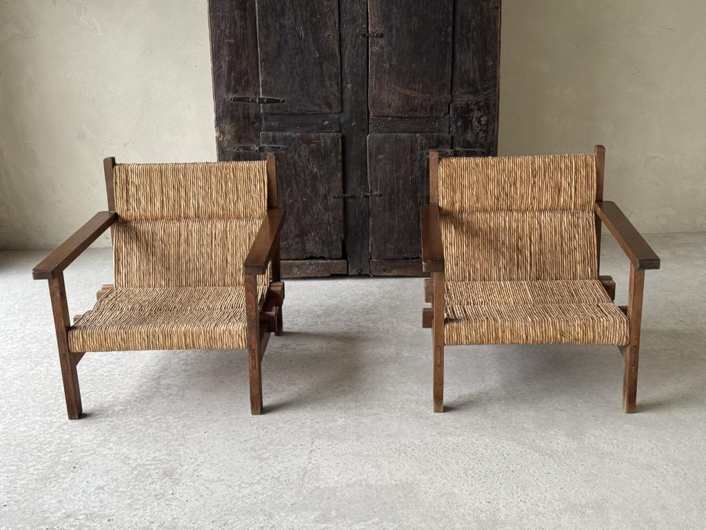 A pair of Spanish Rush seat Armchairs