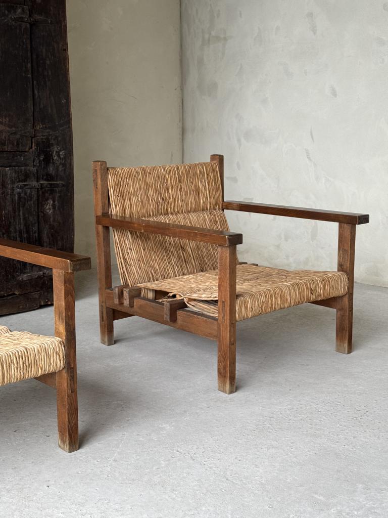 A pair of Spanish Rush seat Armchairs