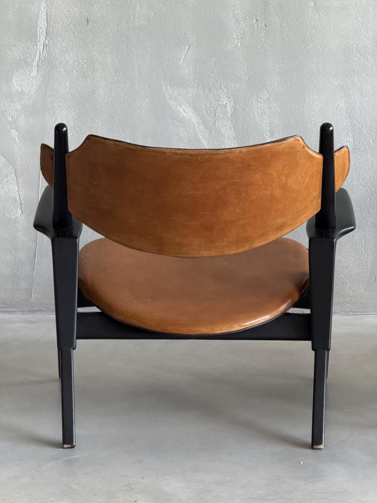A Set of Hans Wegner style Leather Chairs
