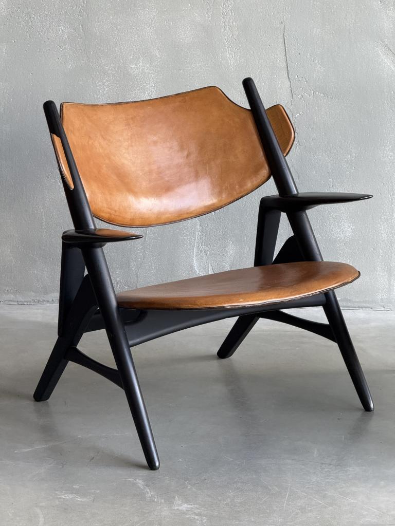 A Set of Hans Wegner style Leather Chairs