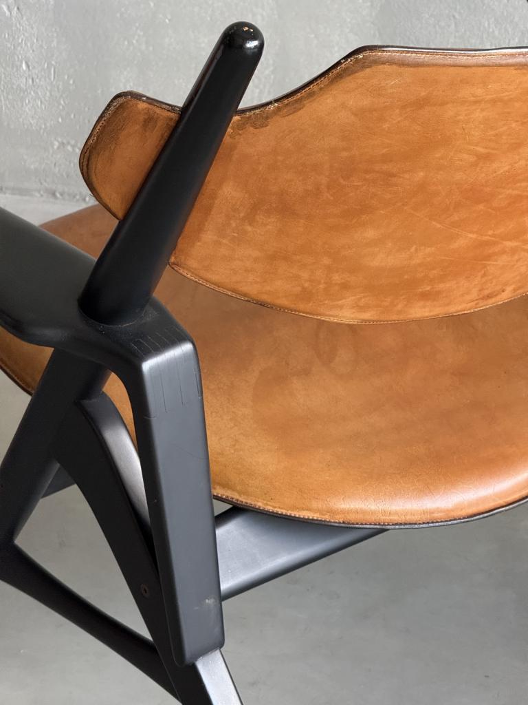 A Set of Hans Wegner style Leather Chairs