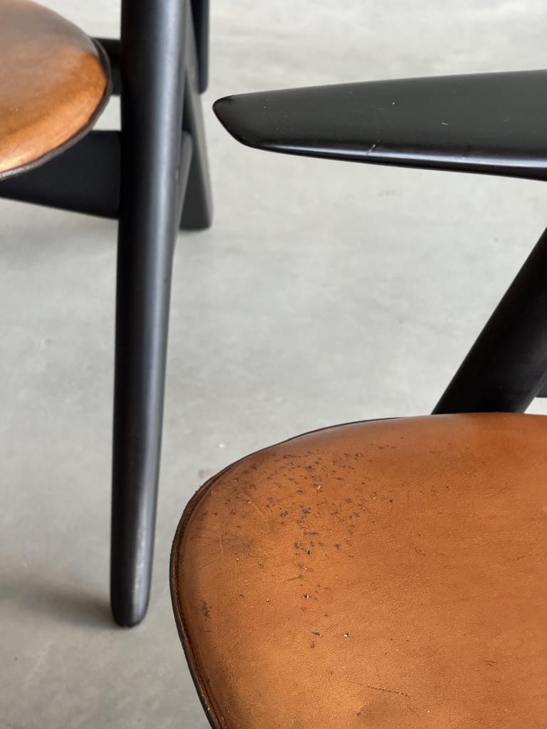 A Set of Hans Wegner style Leather Chairs