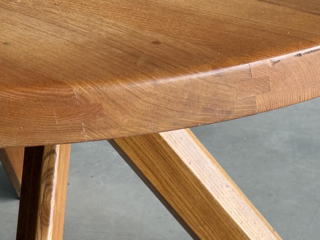 A T21B Circular Elm Table by Pierre Chapo