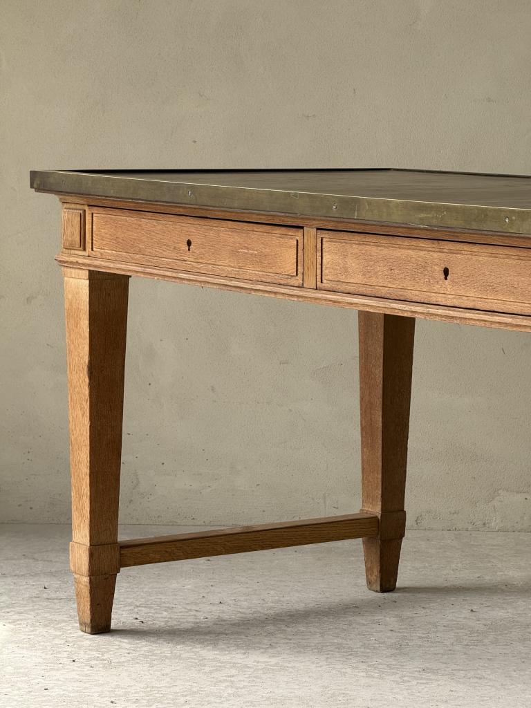 A Jacques Adnet style Oak Desk