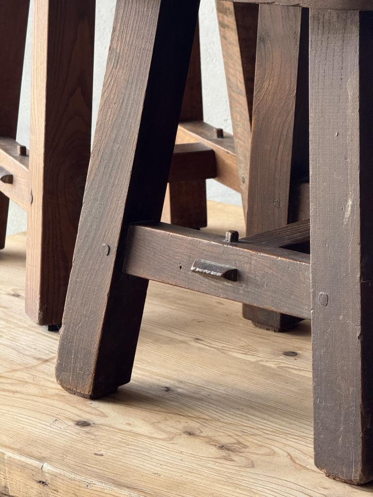 A set of 12 massive Elm Stools