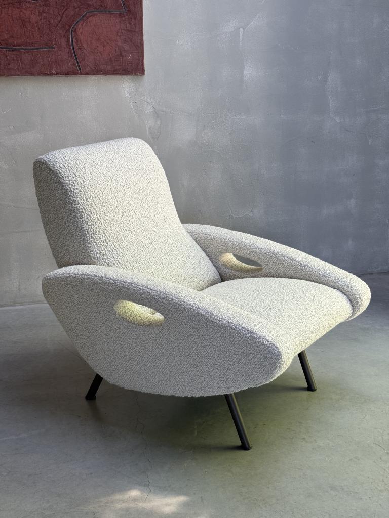 A Rare pair of Francois Letourneur Armchairs