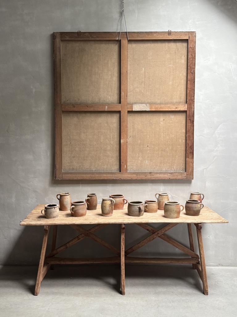 A Collection of 12 Stoneware Pots